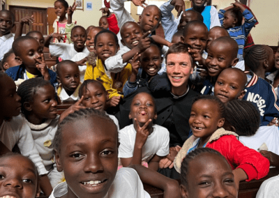 man and children smiling