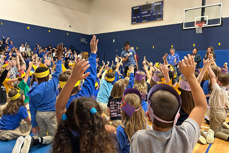 Bengal Bouts’ Dylan Cha Presents to Christ the King Catholic School